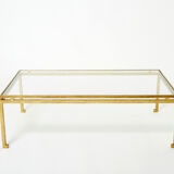 Table basse fer battu doré verre Maison Ramsay 1950