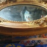 Oval mirror XIXth 43x56cm