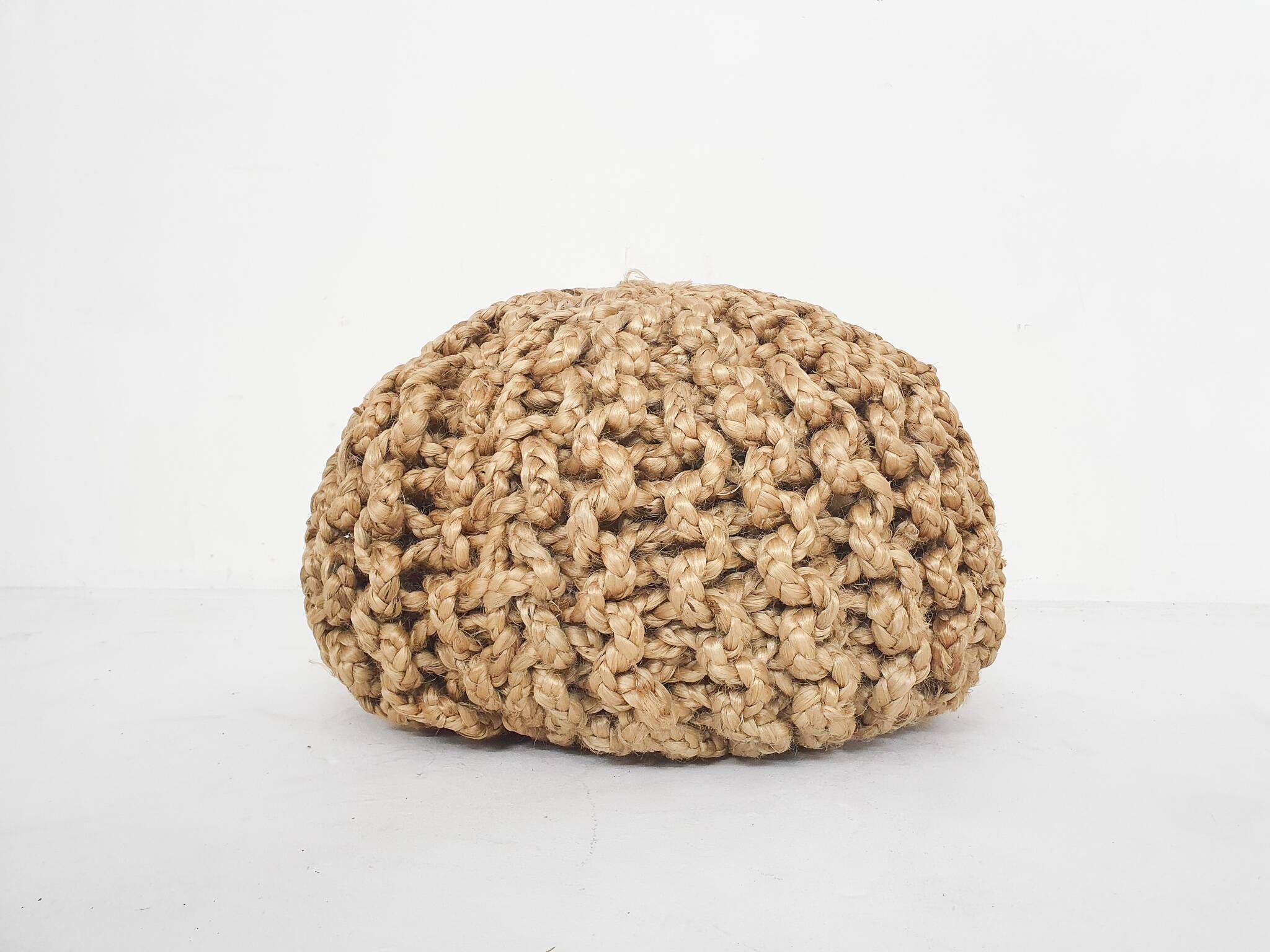 Vintage ottoman made of rope