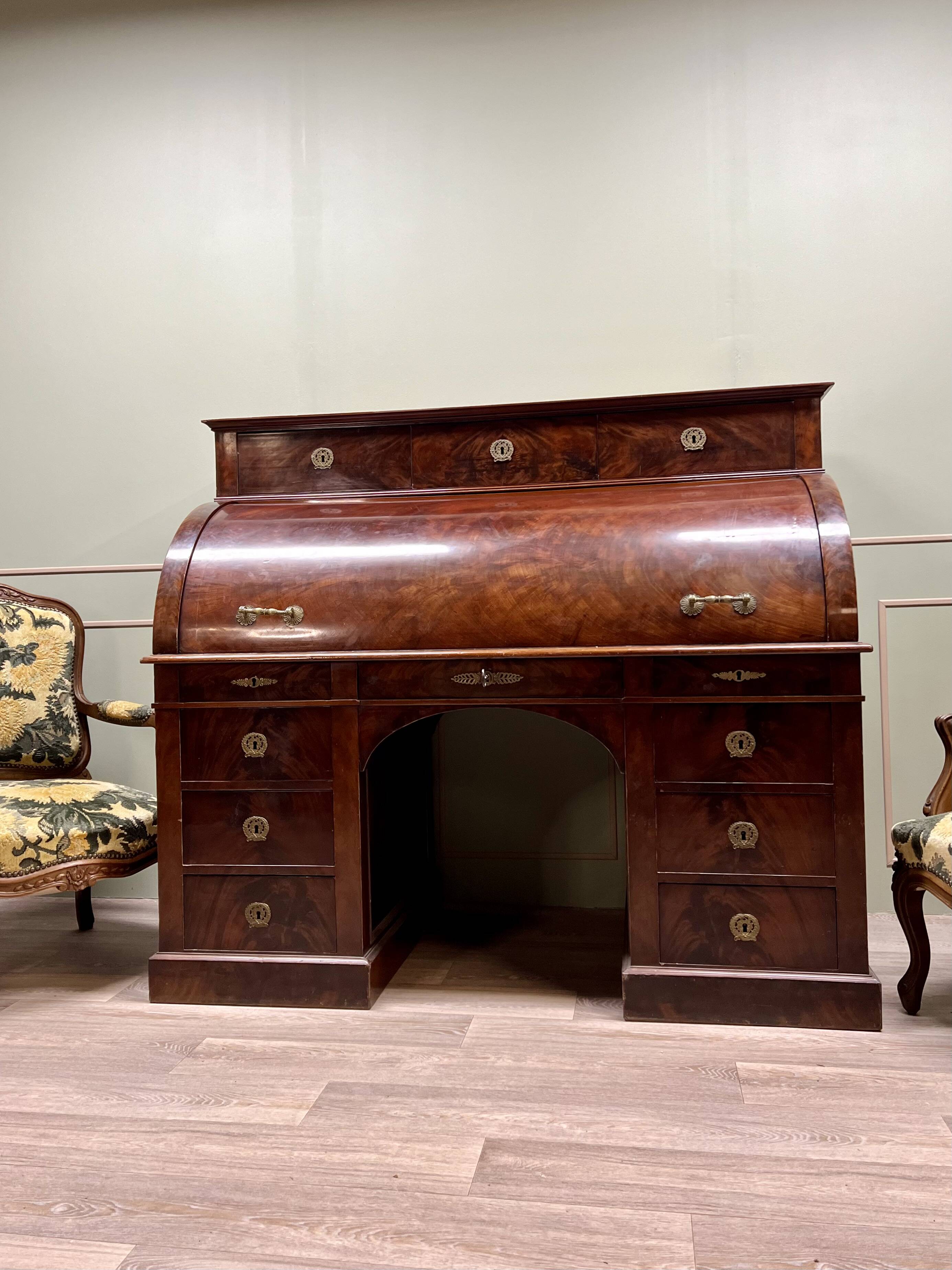 Cylinder desk in flamed mahogany empire style 19th century