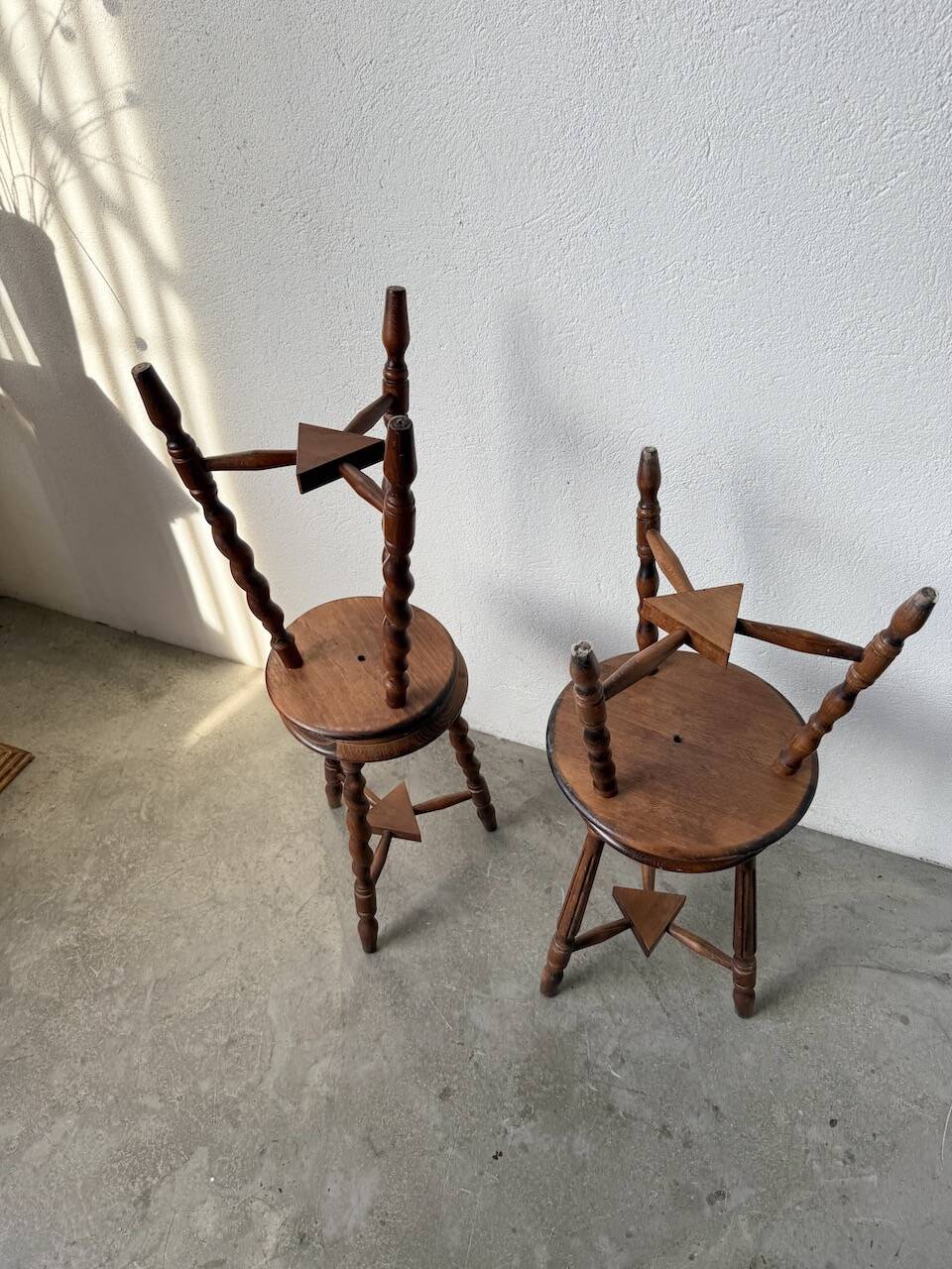 Set of 4 turned oak stools.