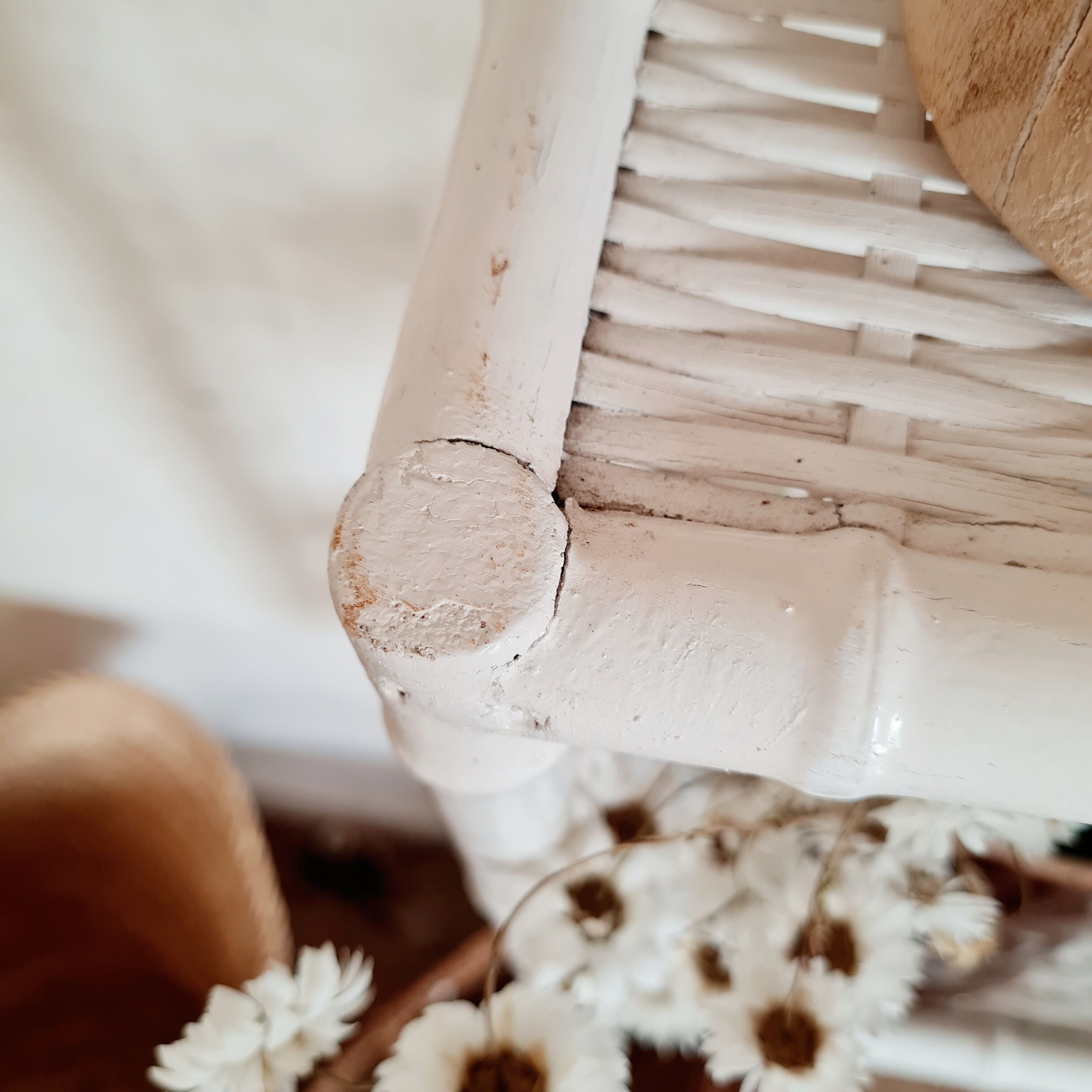 Vintage rattan and bamboo shelves painted white