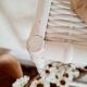 Vintage rattan and bamboo shelves painted white