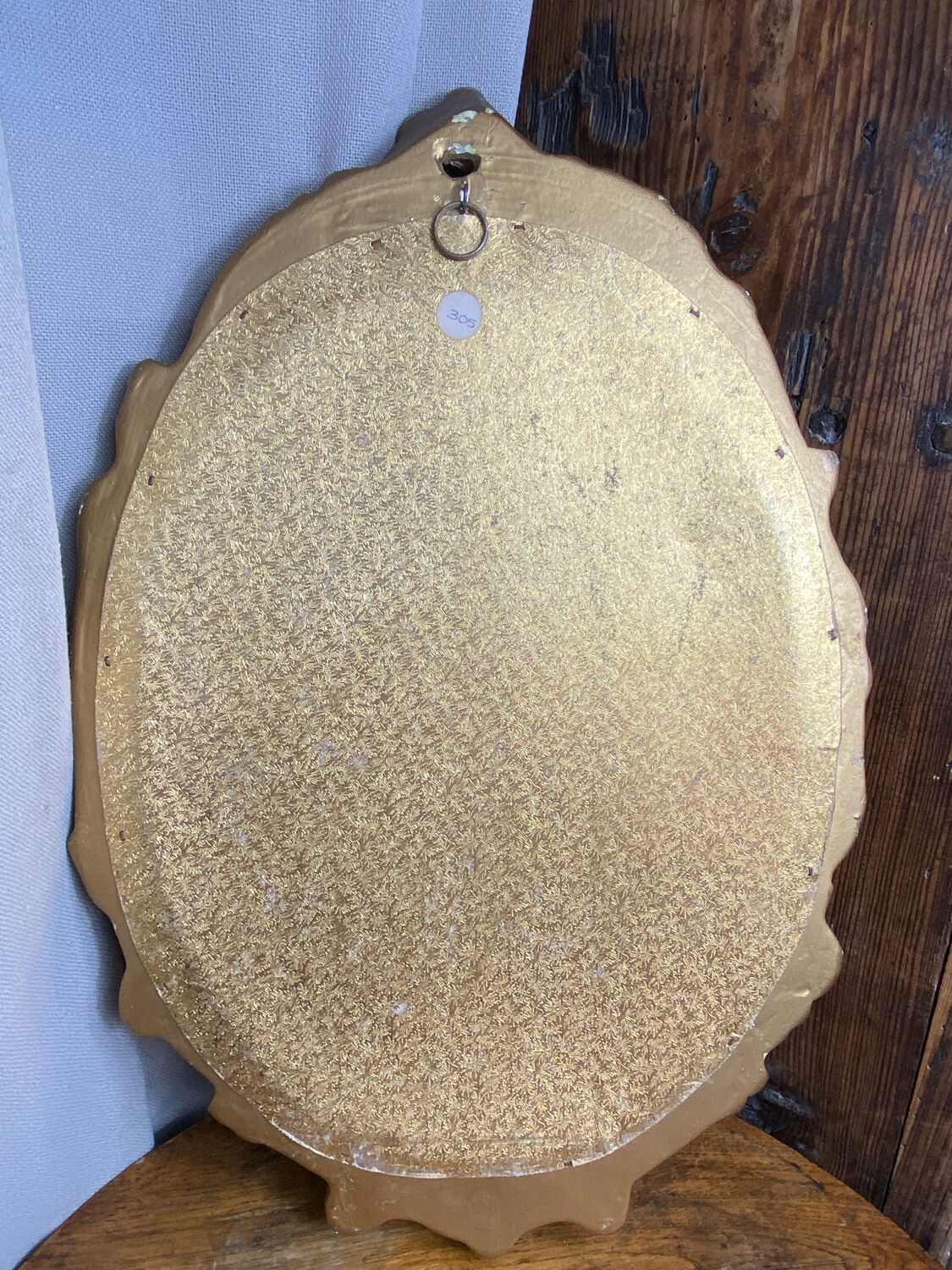 Rococo style mirror in wood and gilded stucco