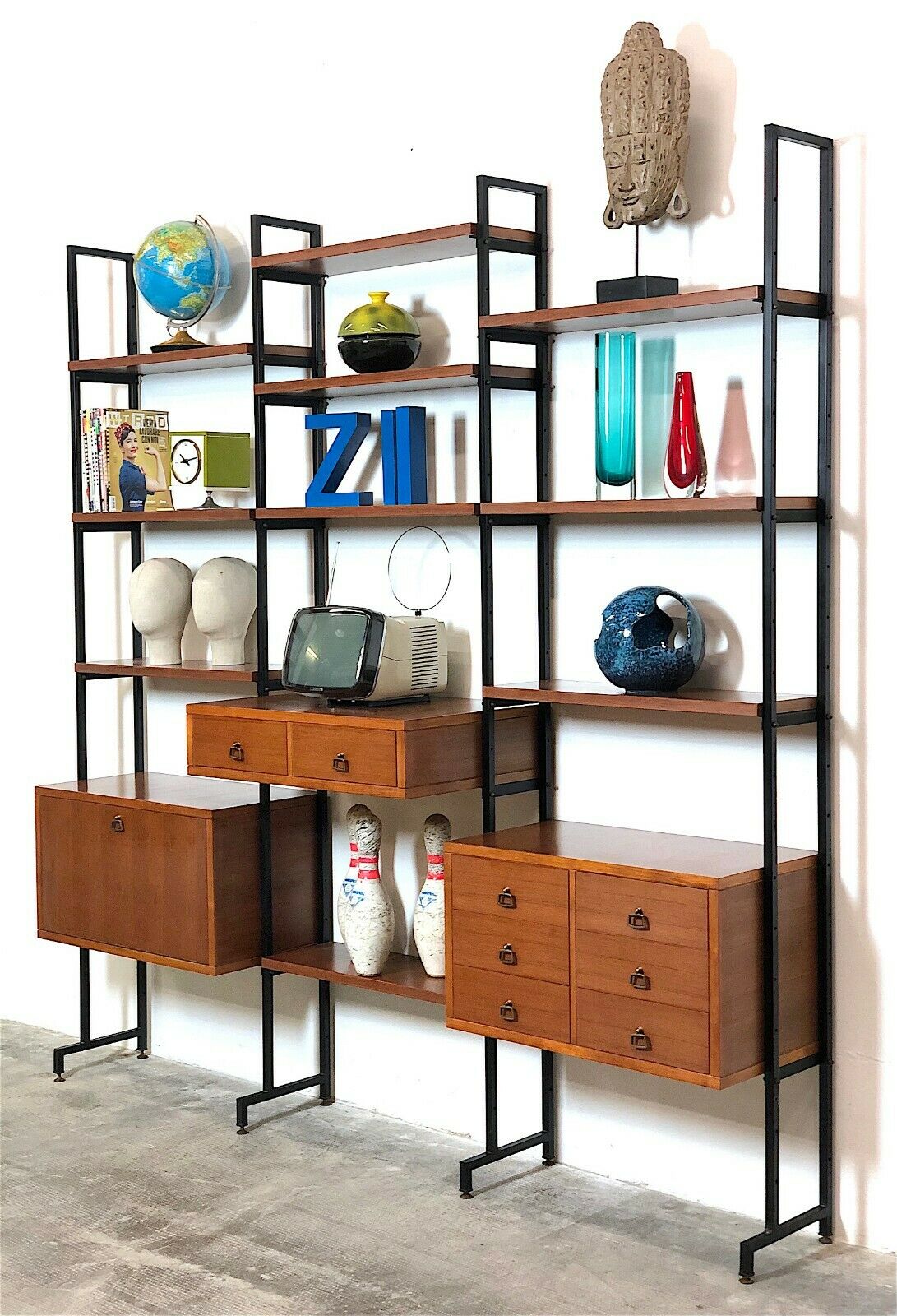 Modular storage unit and teak bookcase. Italy, 60s
