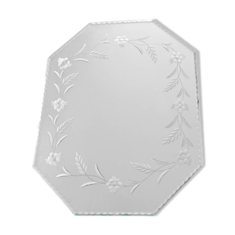 Beveled mirror with floral decor