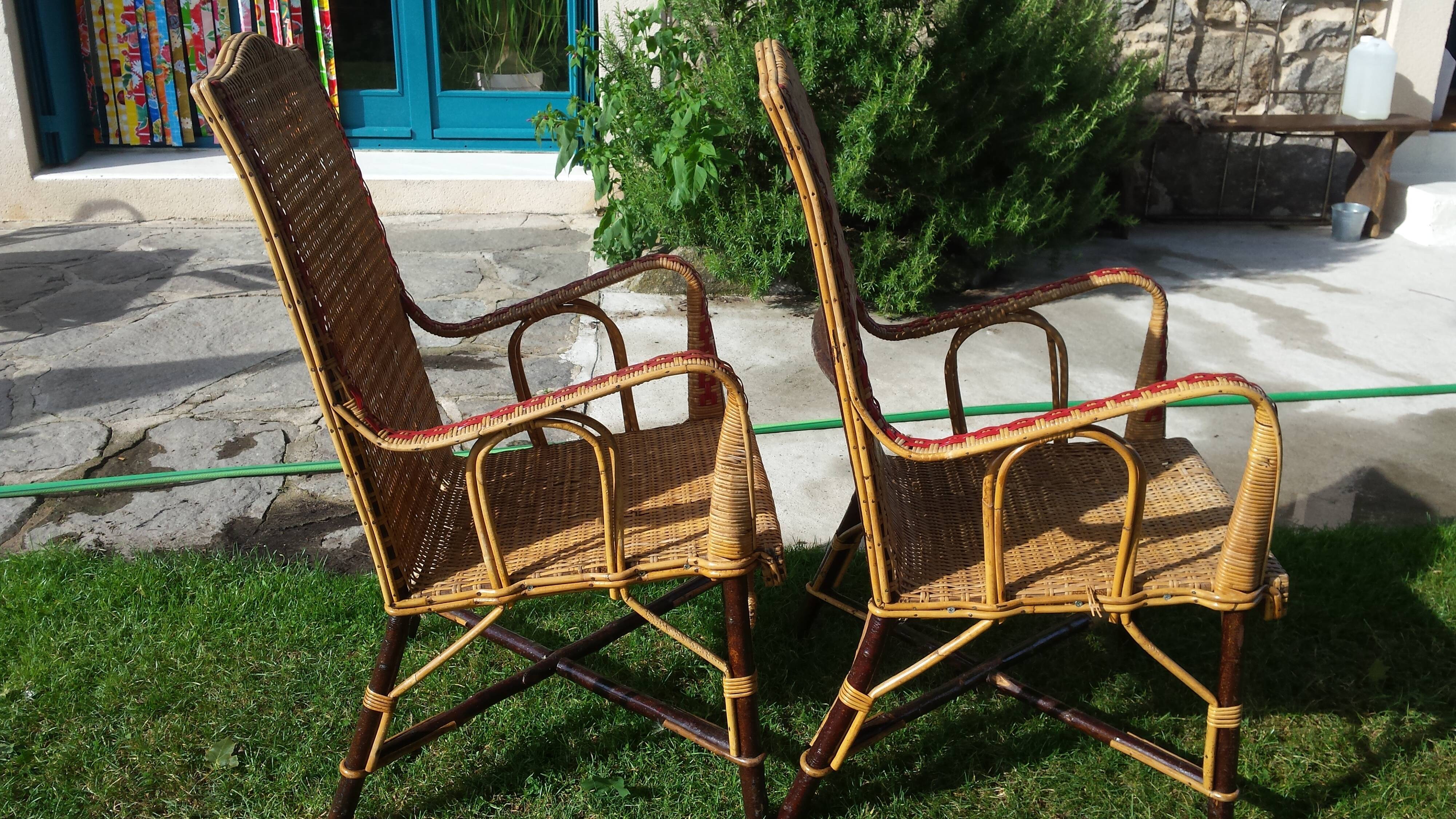 Wicker or rattan armchairs and bamboo