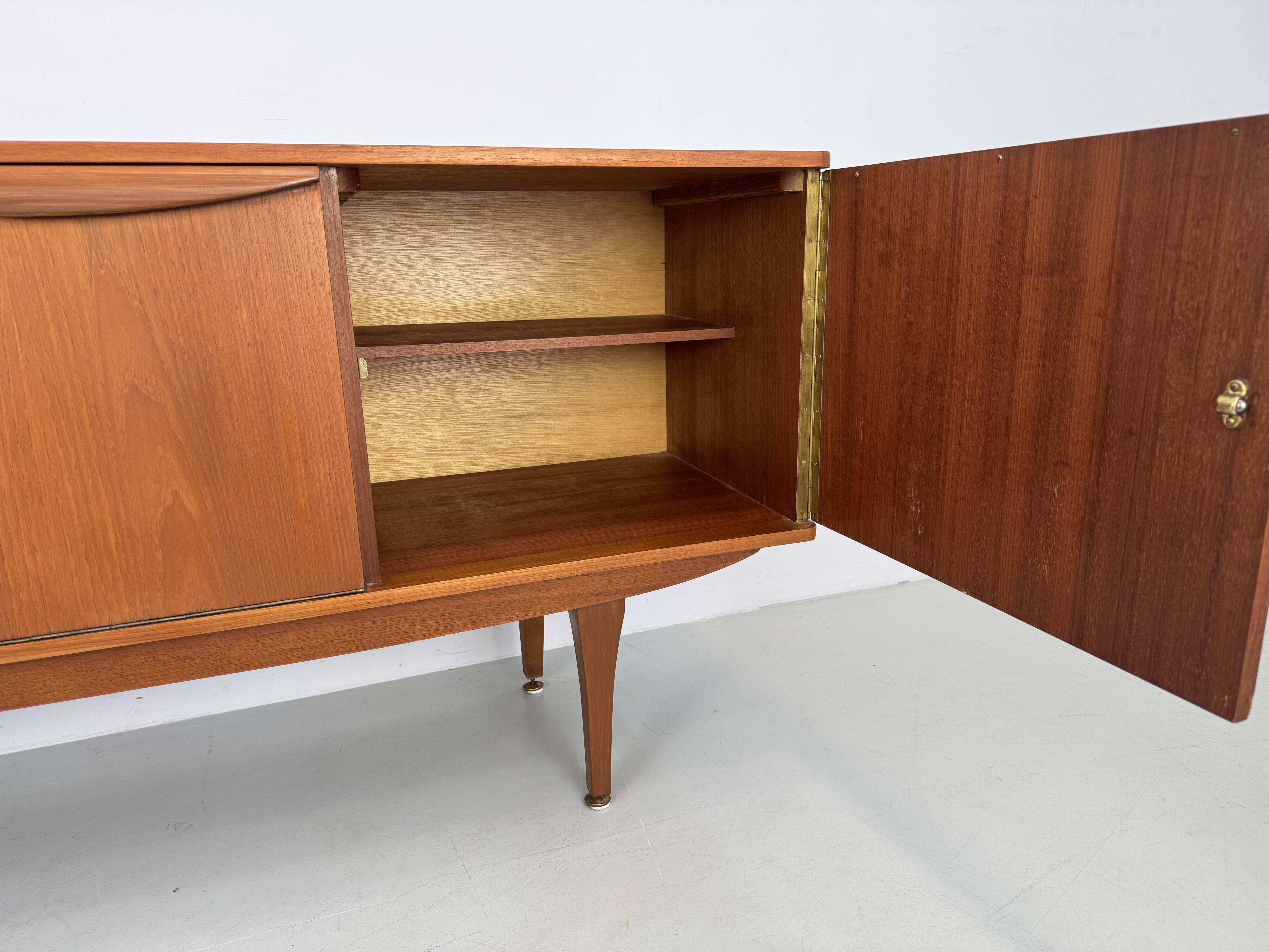 Beautiful and unique Stonehill sideboard from the 1960s made of teak.