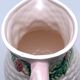 Pale pink slip decanter and colorful fruist