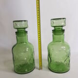 Pair of green moulded glass bottles 70s