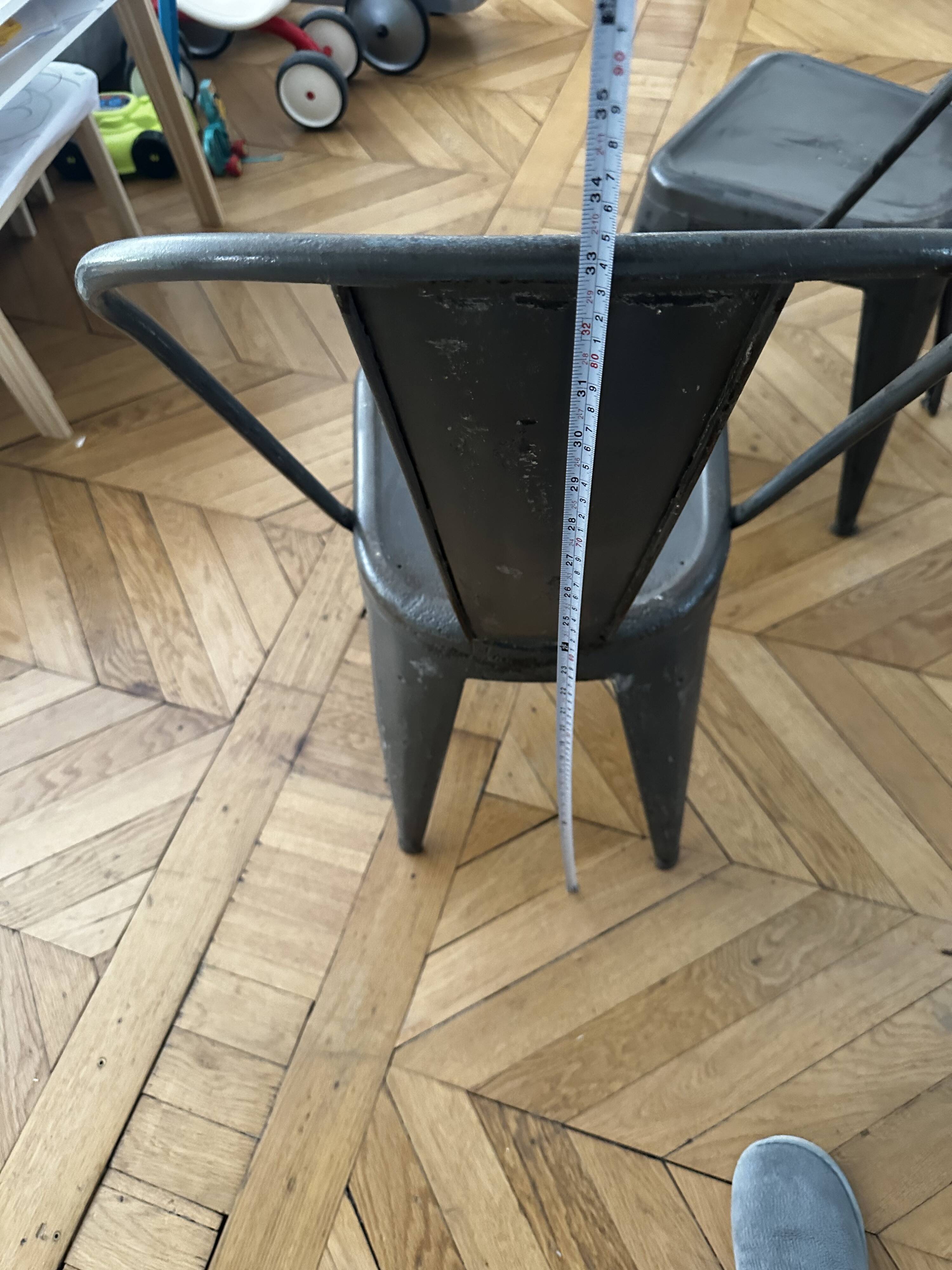 Pair of vintage Tolix model A chairs, designed by Xavier Pauchard.