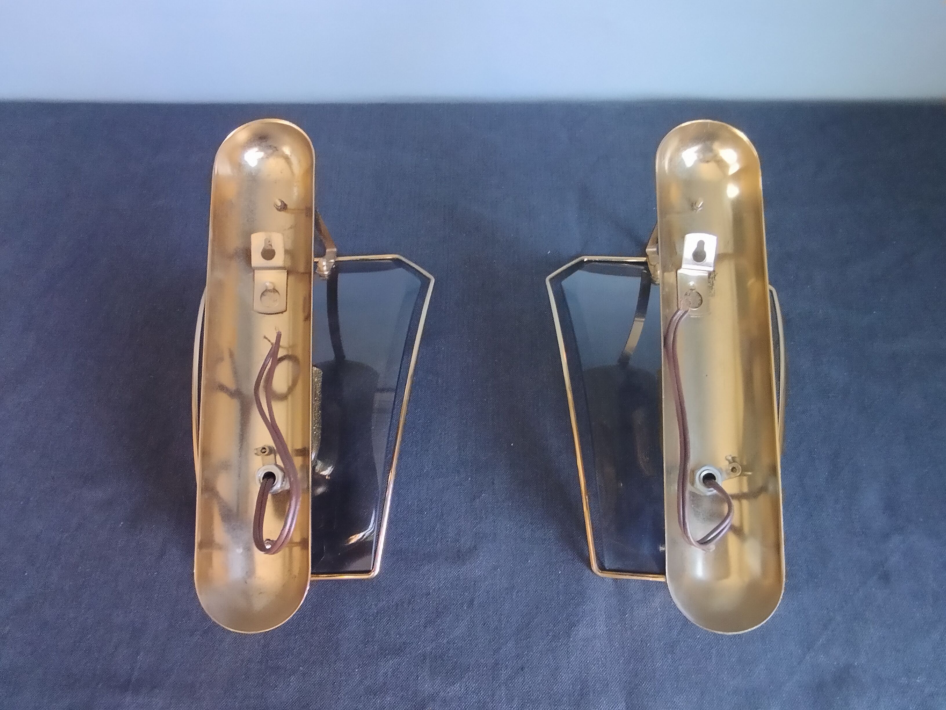Pair of brass and curved glass wall lamps from the 80s