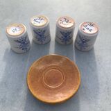 4 ceramic cups and saucers