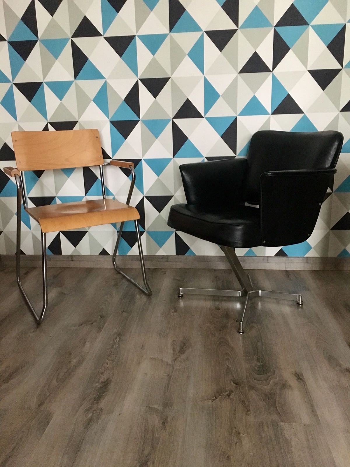 Modernist armchair with armrests
