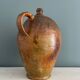 Large 19th century oil bottle in glazed earthenware