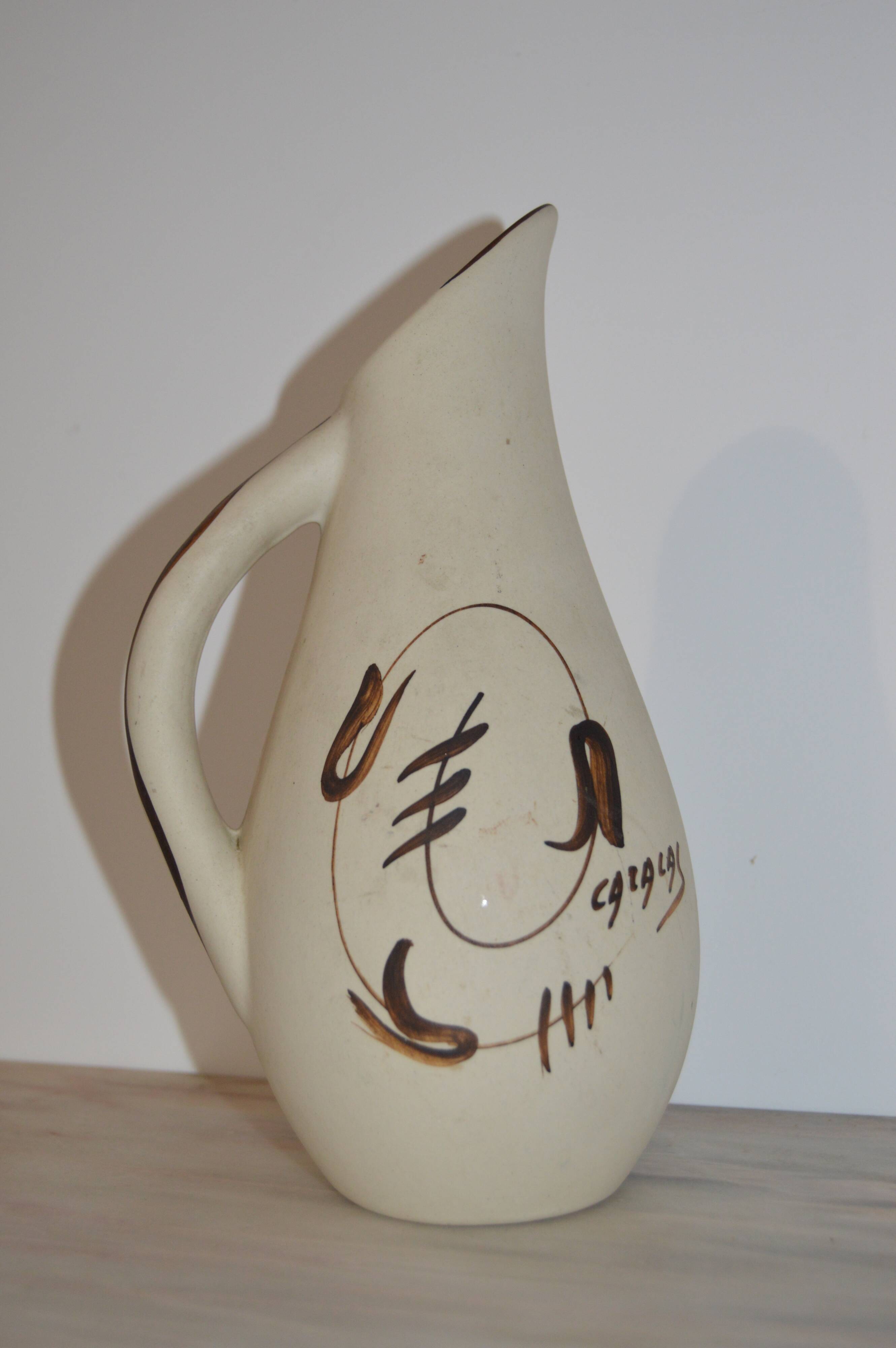 Ceramic pitcher signed Cazalas