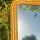 Antique gilded patinated Louis-Philippe mirror