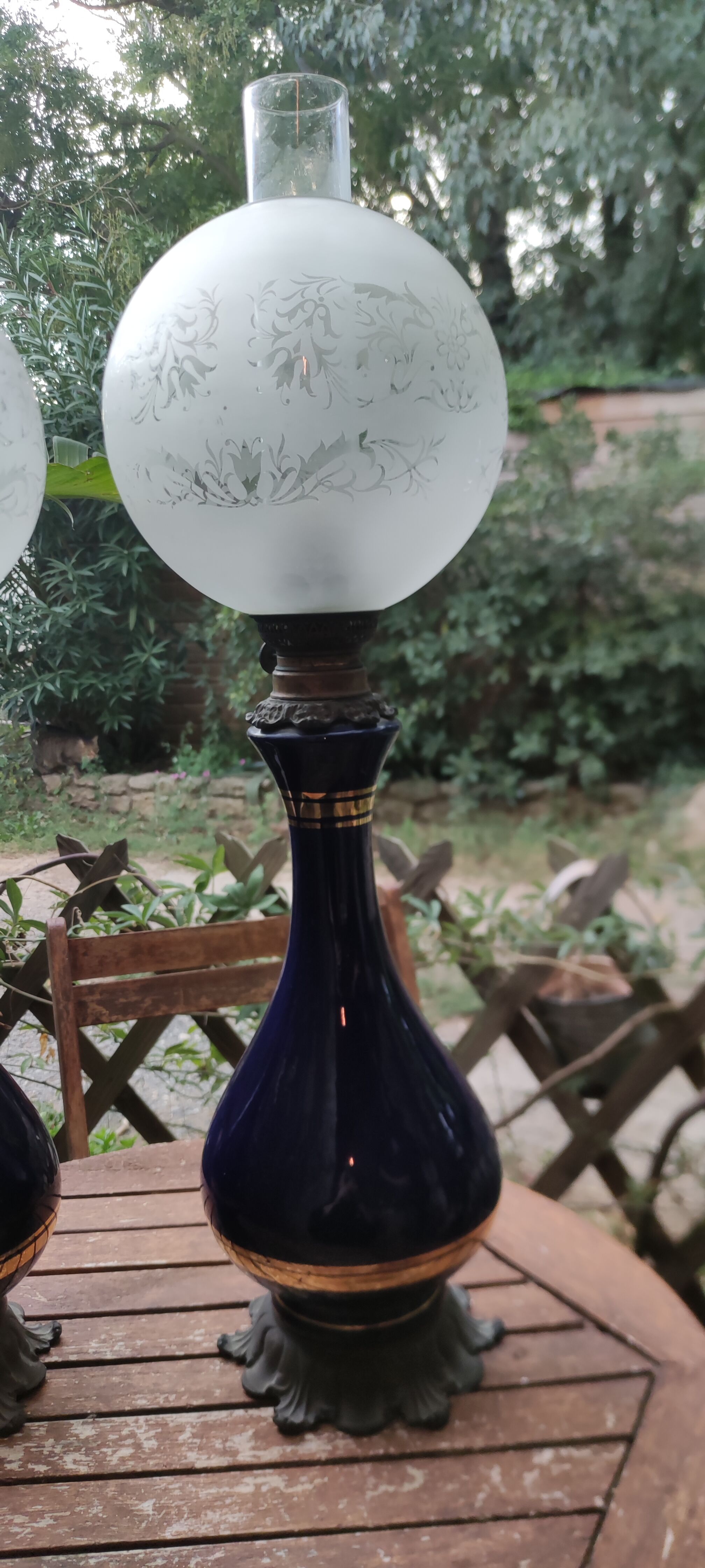 Pair of dark blue kerosene lamps