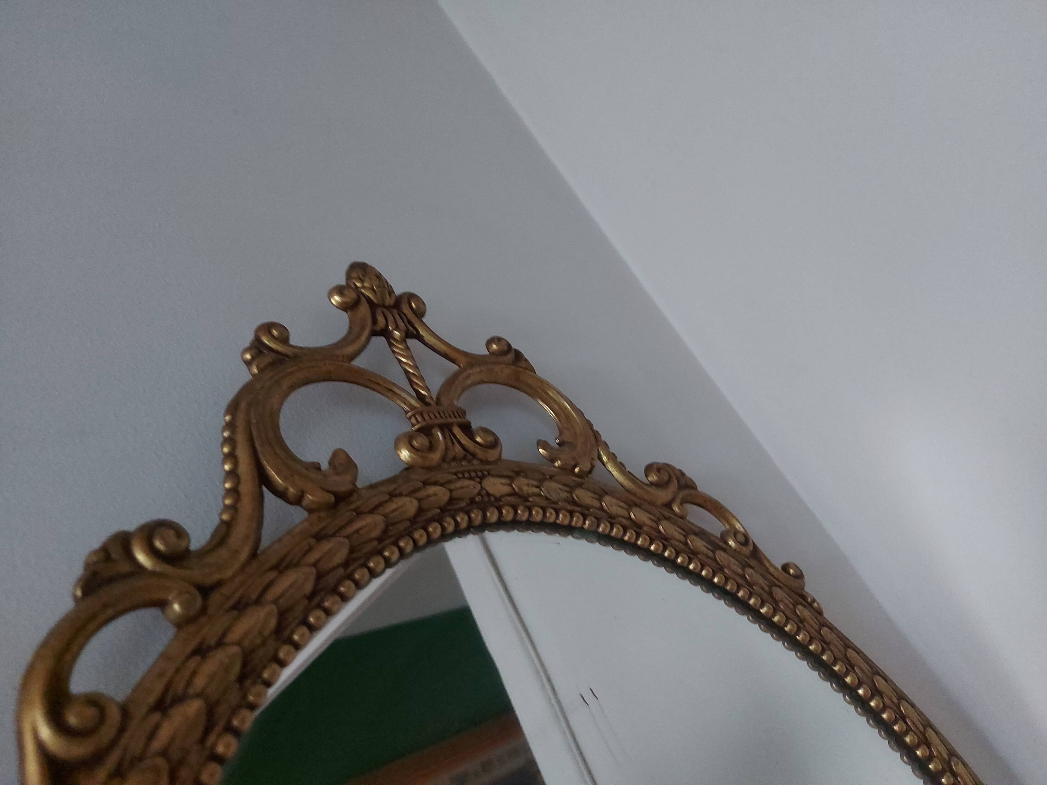 Baroque mirror in gilded brass, C.G.R