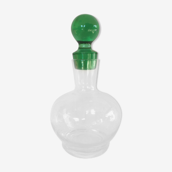 Glass wine carafe with green glass cap