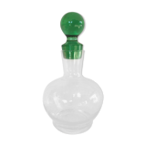 Glass wine carafe with green glass cap
