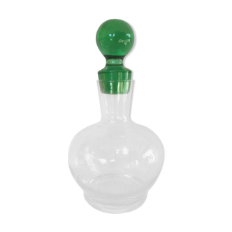 Glass wine carafe with green glass cap
