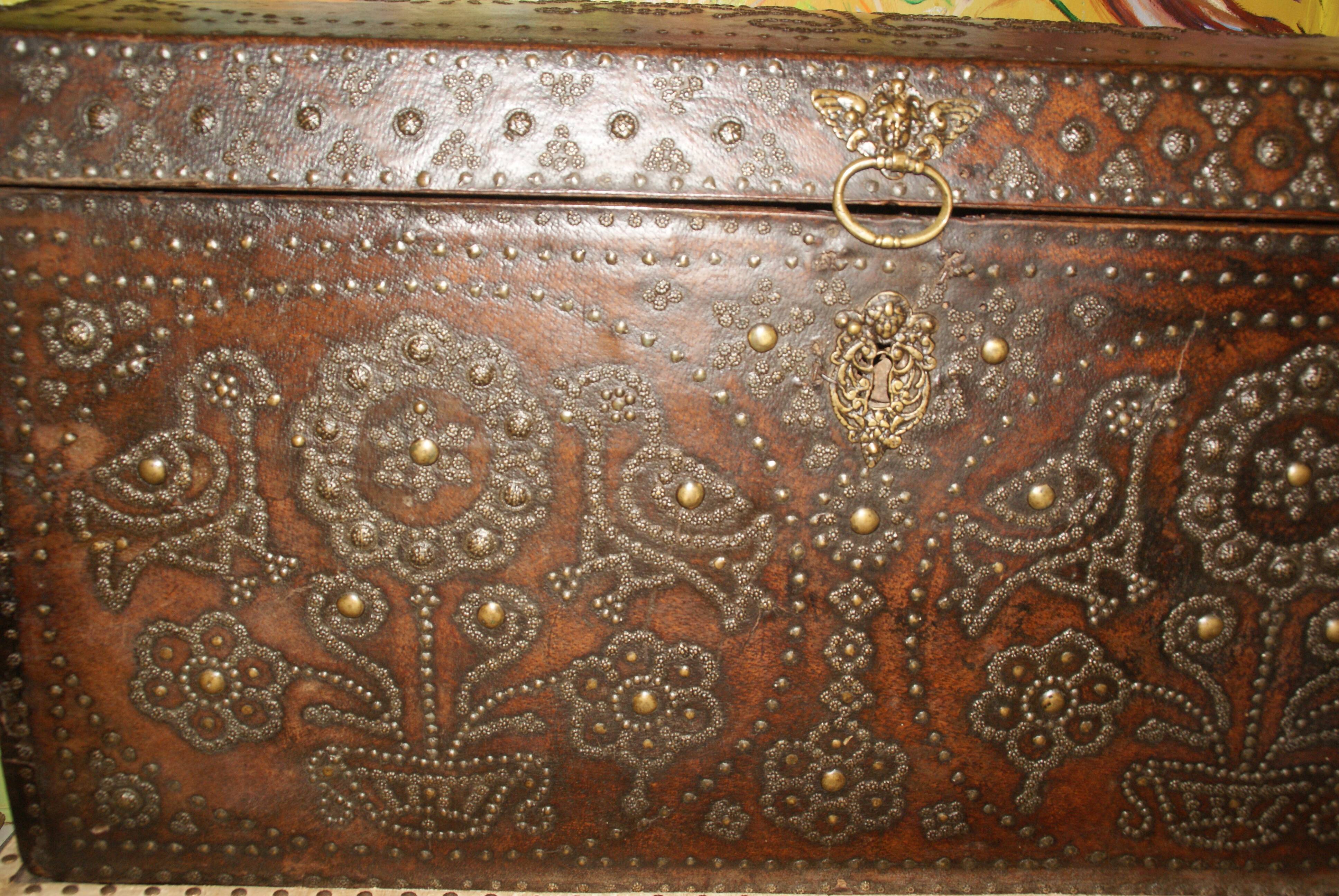 17th century studded leather travel trunk, richly decorated