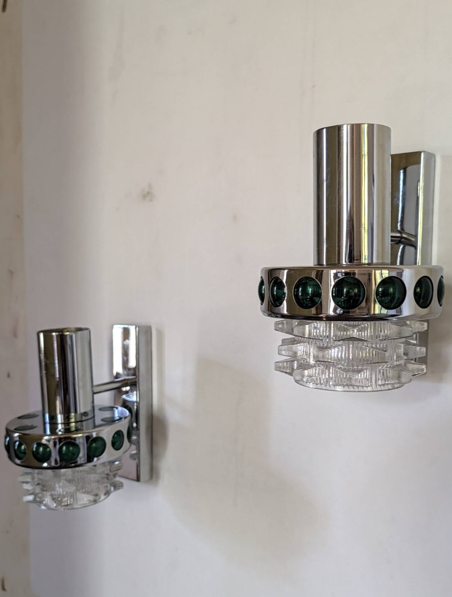 Pair of Space Age wall lights in chrome and green glass, 1970s.