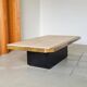Coffee table in brass and travertine.