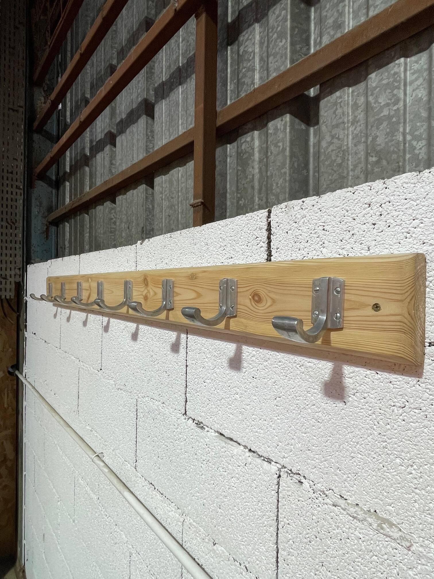Vintage wall coat rack from the 1960s.