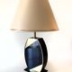 Pair of table lamps, the dolphin, black cream and gold 1970