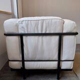 A sofa and two LC2 Cassina armchairs