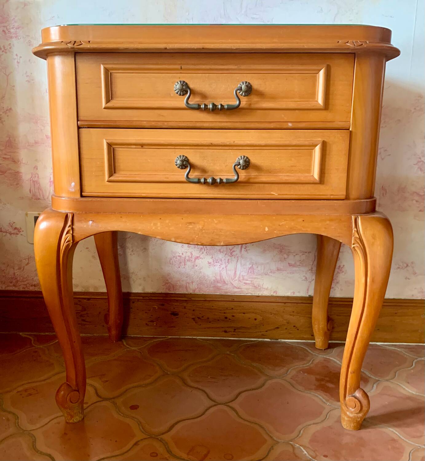 Classic carved cherry bedside table with glass top