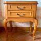 Classic carved cherry bedside table with glass top