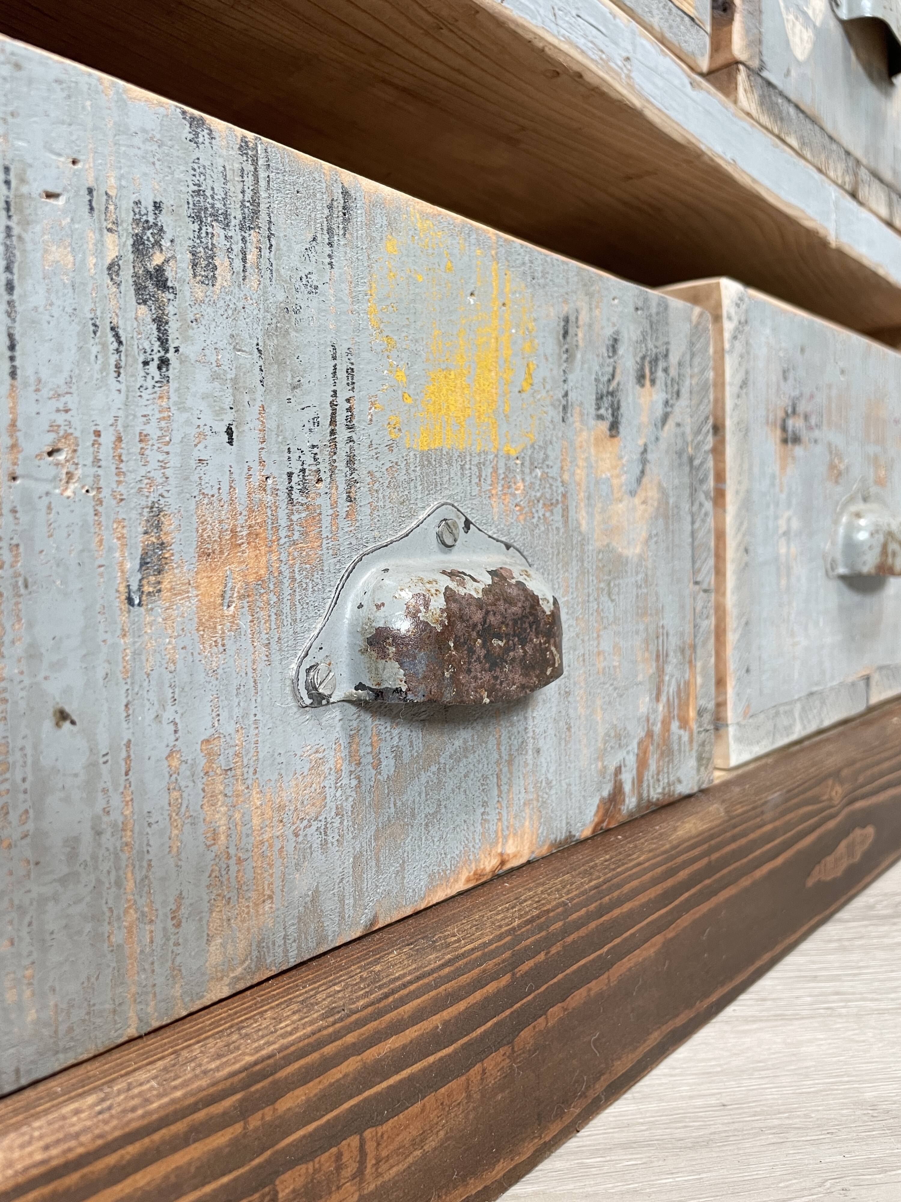 Artisanal workshop bank in patinated wood, circa 1950.