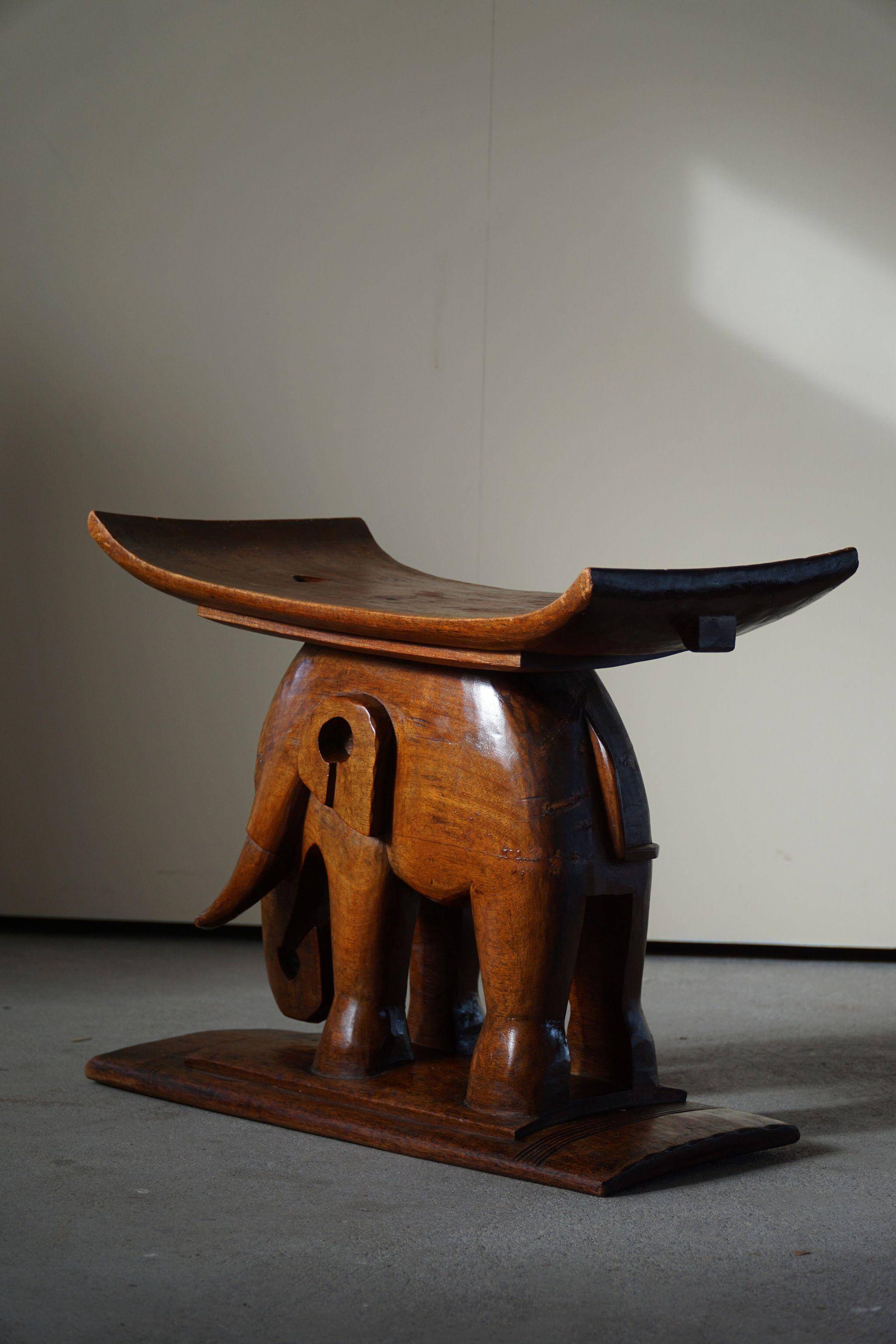 African elephant stool in carved wood, mid-century in Wabi Sabi style, 1940s.