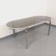 Vintage oval dining table in smoked glass and chrome metal, Space Age style.