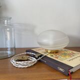 Vintage desk table lamp in antique glass with a brass base.