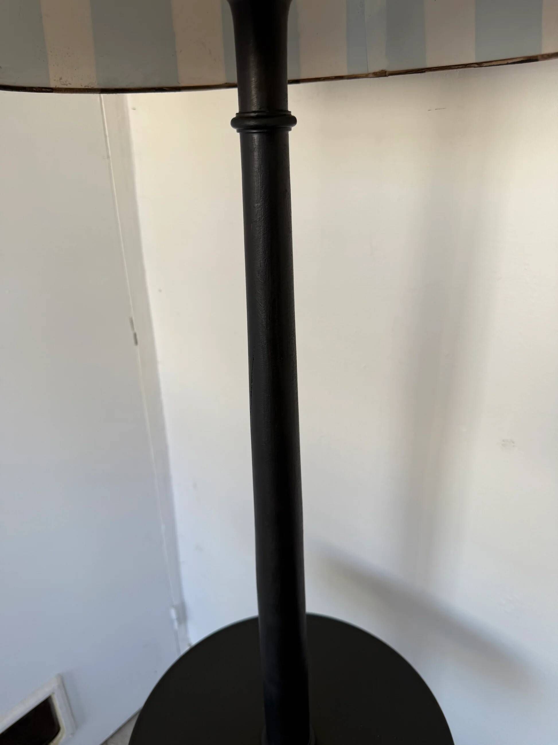 Vintage floor lamp in black patinated wood and striped lampshade