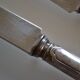 12 silver metal dessert or cheese knives