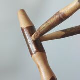 Pair of walnut stools sculpted in a vintage mid-century cross-section.