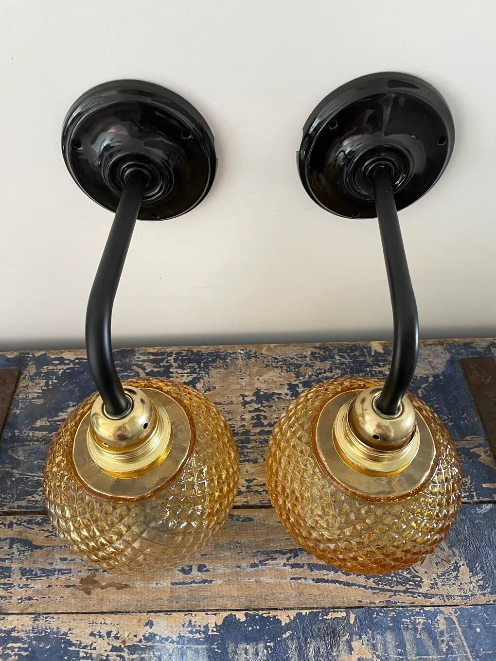 Pair of vintage sconces in electrified golden glass to nine