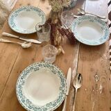 Set of eight Moulin des loups soup plates