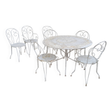 Wrought iron garden furniture from the early 20th century.