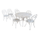 Wrought iron garden furniture from the early 20th century.