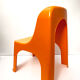 Children's chair in orange plastic