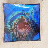 Empty pocket in psychedelic enamelled leather