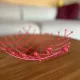 Fuchsia red metal fruit bowl Trådig IKEA Ehlén Johansson