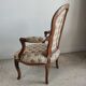 Fauteuil cabriolet de style Louis XVI garniture tapisserie fleurie