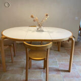 Attractive designer set: table, chairs and stool